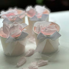 Small wedding tubs with light pink rose petals individually packed